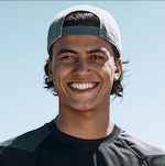 Happy soccer player smiling at the camera during training.