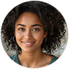 Portrait of a person with natural hair, wearing a black top.