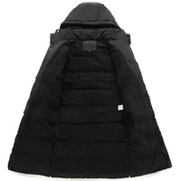 A black, hooded winter coat is shown laid flat and open, displaying its quilted, padded interior lining.