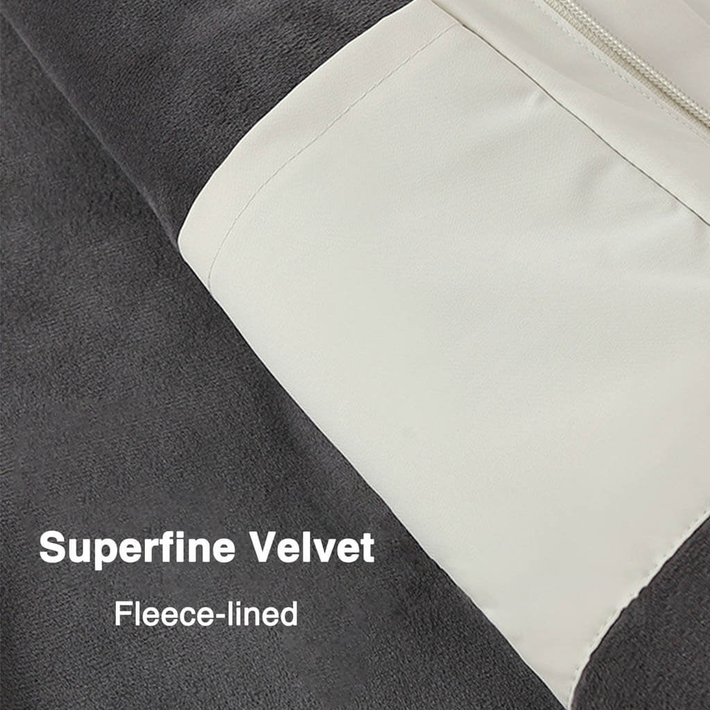 Close-up of a fleece-lined fabric showing a contrast between dark gray superfine velvet and a light cream section with a zipper, labeled "Superfine Velvet, Fleece-lined.